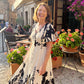 👗 50% KORTING NU! 🌿 Zachte Botanische Print V-Hals Midi Jurk – Elegant, Lichtgewicht & Veelzijdig voor Elke Gelegenheid 🌸