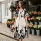 👗 50% KORTING NU! 🌿 Zachte Botanische Print V-Hals Midi Jurk – Elegant, Lichtgewicht & Veelzijdig voor Elke Gelegenheid 🌸
