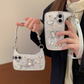 📱 TIJDELIJKE KORTING VAN 50%! ✨ 3D-handtas-telefoonhoesje met vlindermotief – Strass, afneembare riem, schokbestendig 🦋