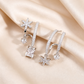 Dames Asymmetrische Zirconia Ster Nevel Oorbellen